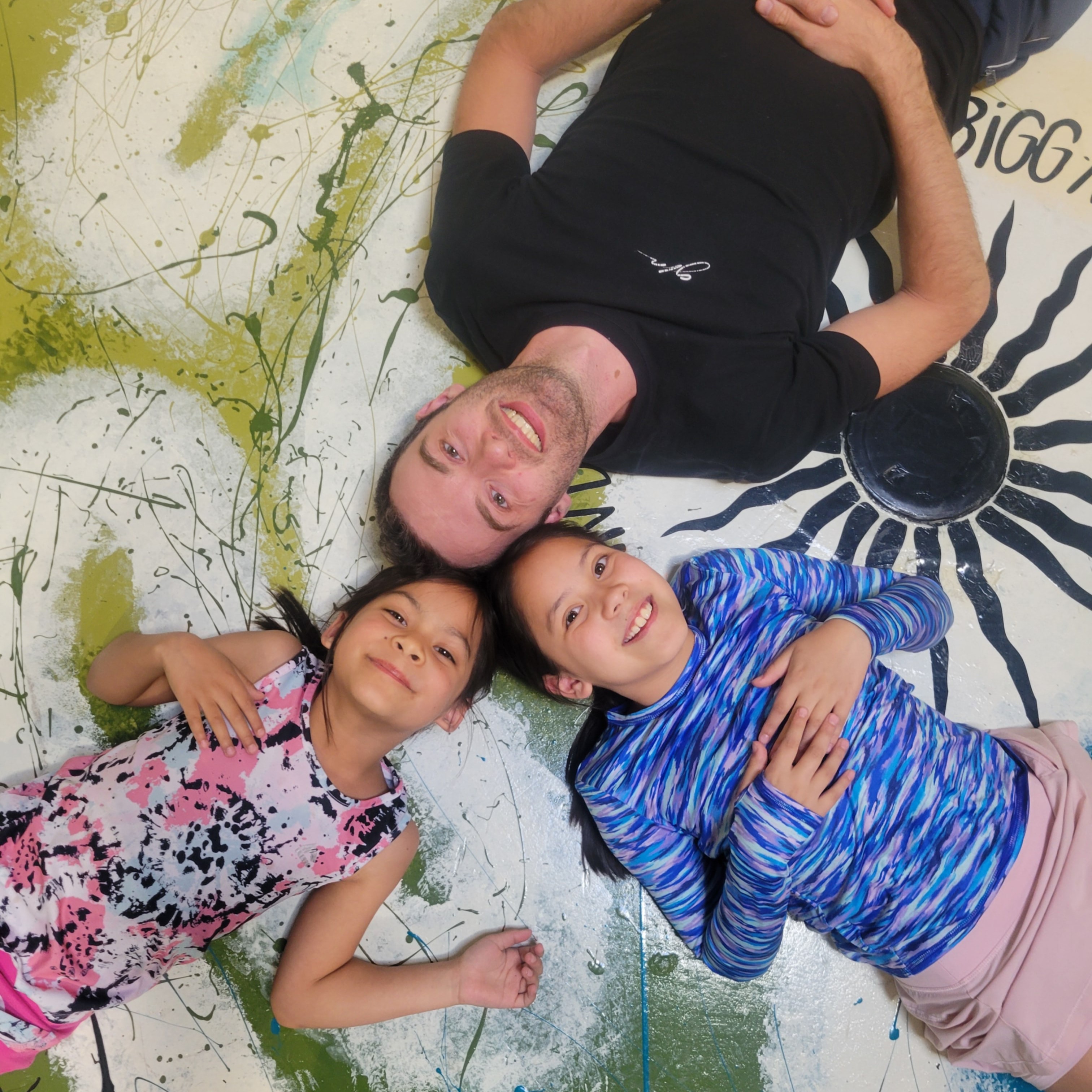 Mark with students and families
